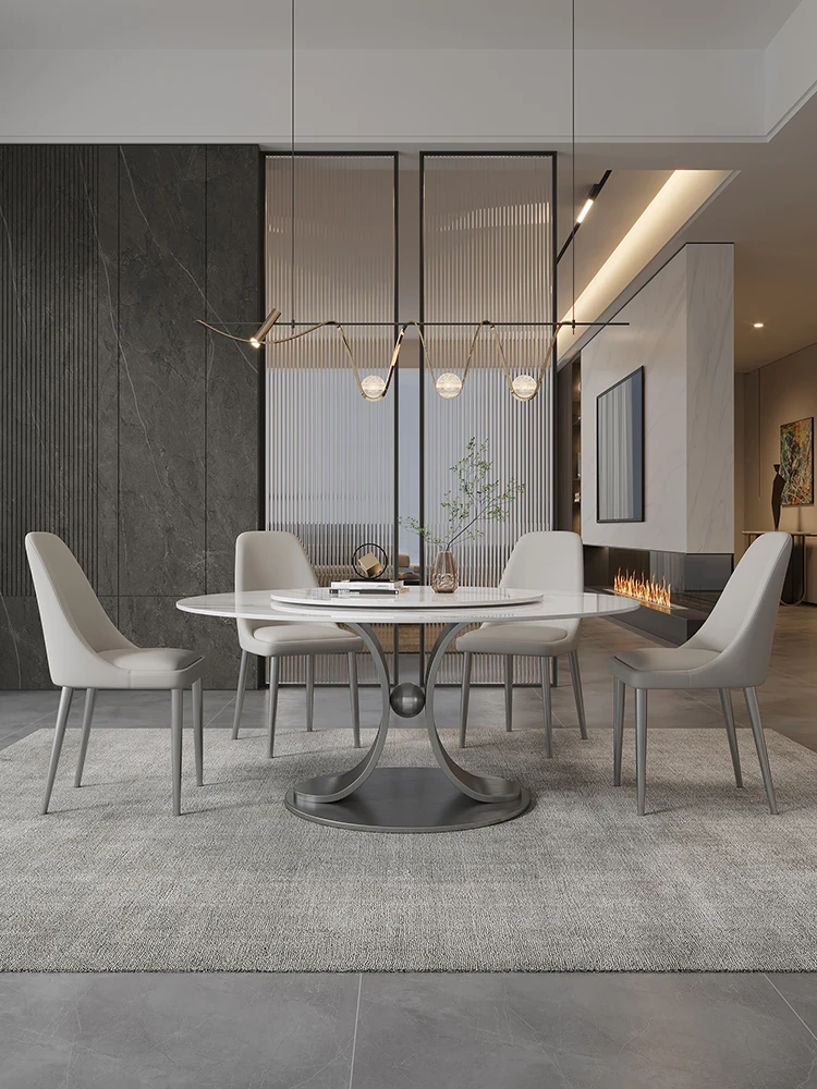 Italyan kaya plakası yuvarlak yemek masası pikap ile ışık lüks modern basit ev yemek masası sandalye kombinasyonu
